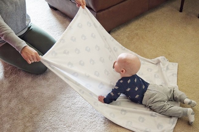 Baby rocker that shop baby lays on stomach